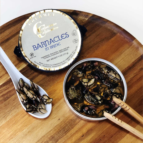 Authentic Galician barnacles preserved in brine, offering a unique and exquisite taste of the Spanish coast by Conservas de Cambados.

